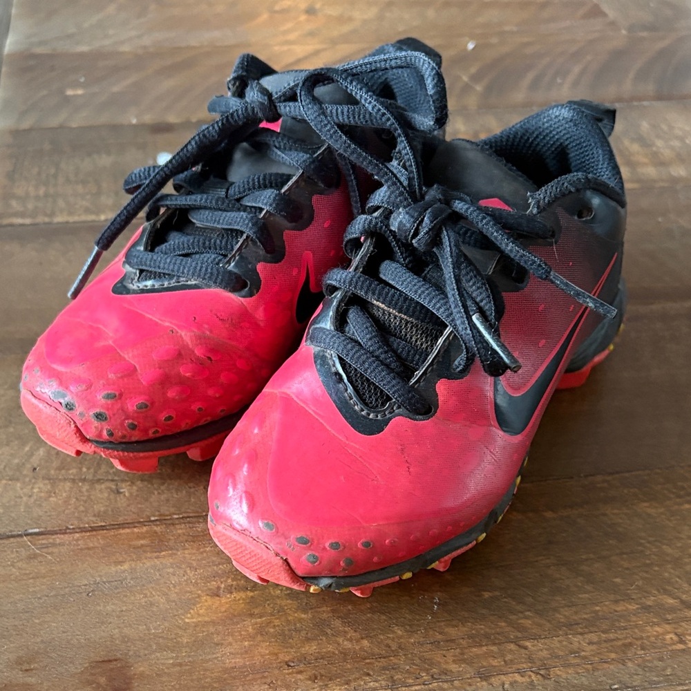 Nike Kids pink and black cleats